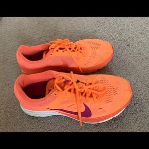 Orange and purple Nike shoes size 8